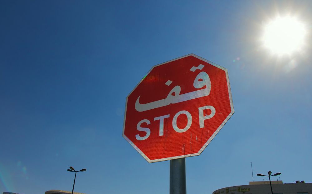 Arabic stop sign red
