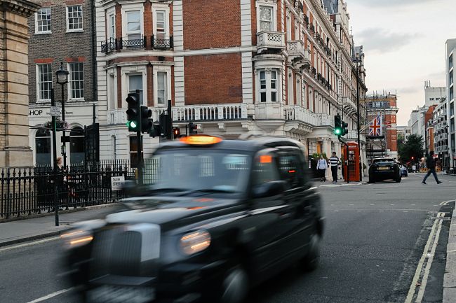 Black cab drives through London