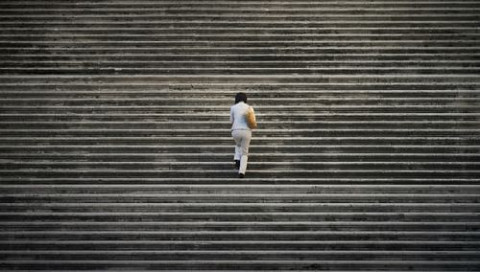 woman-walks-steps-up