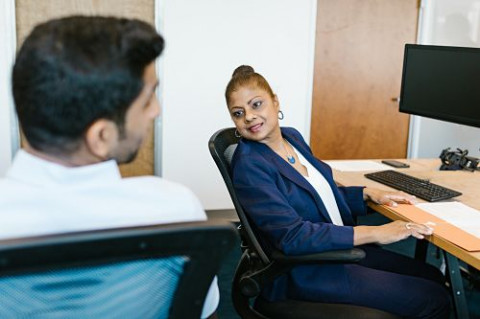 two-indian-professionals-desk