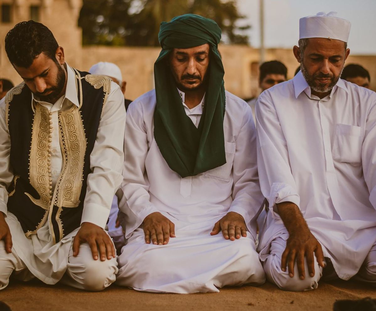 libyan men at prayer