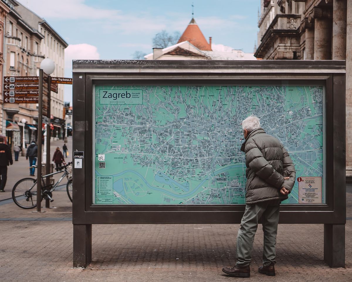 man reading map zagreb