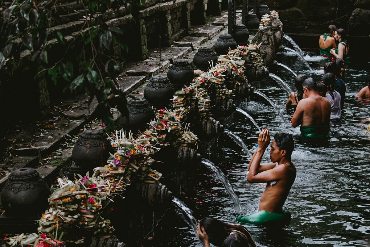 men washing temple bali