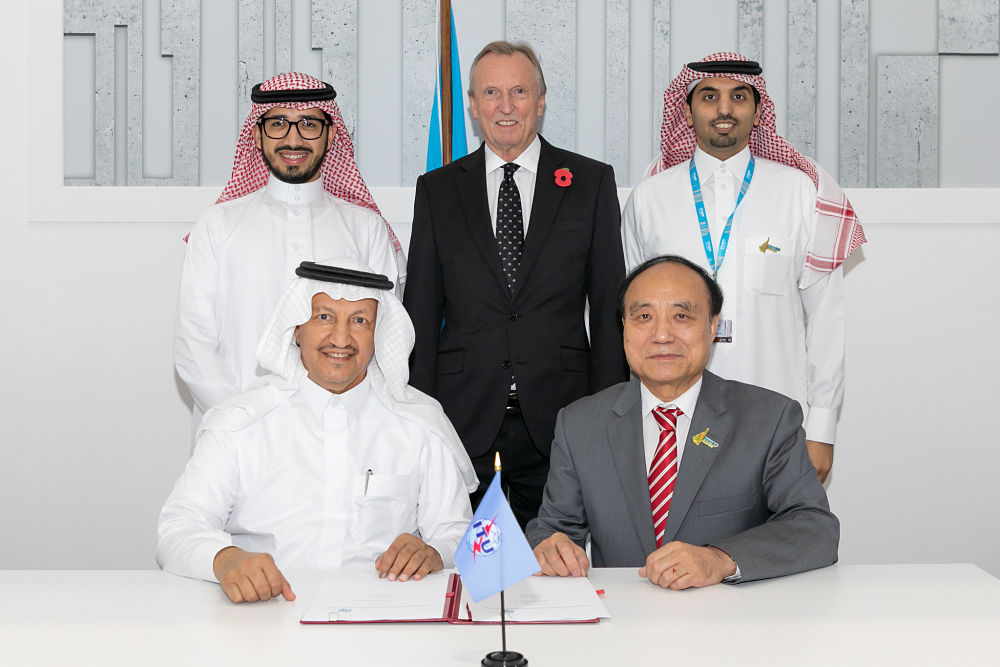 Saudis at Signing Ceremony with Western Guest