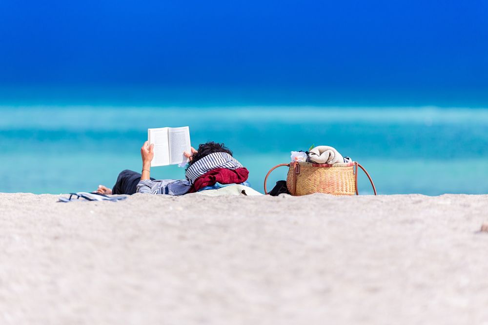 reading book on beach