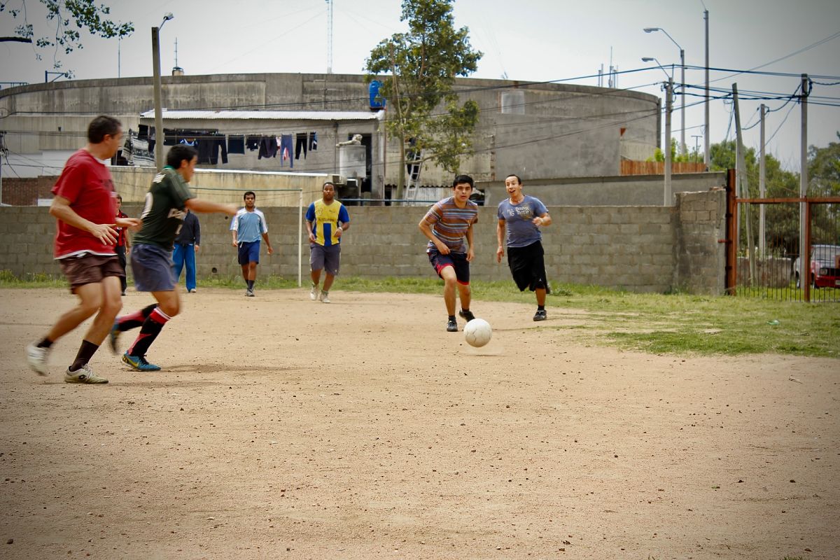 men playing football uruguay