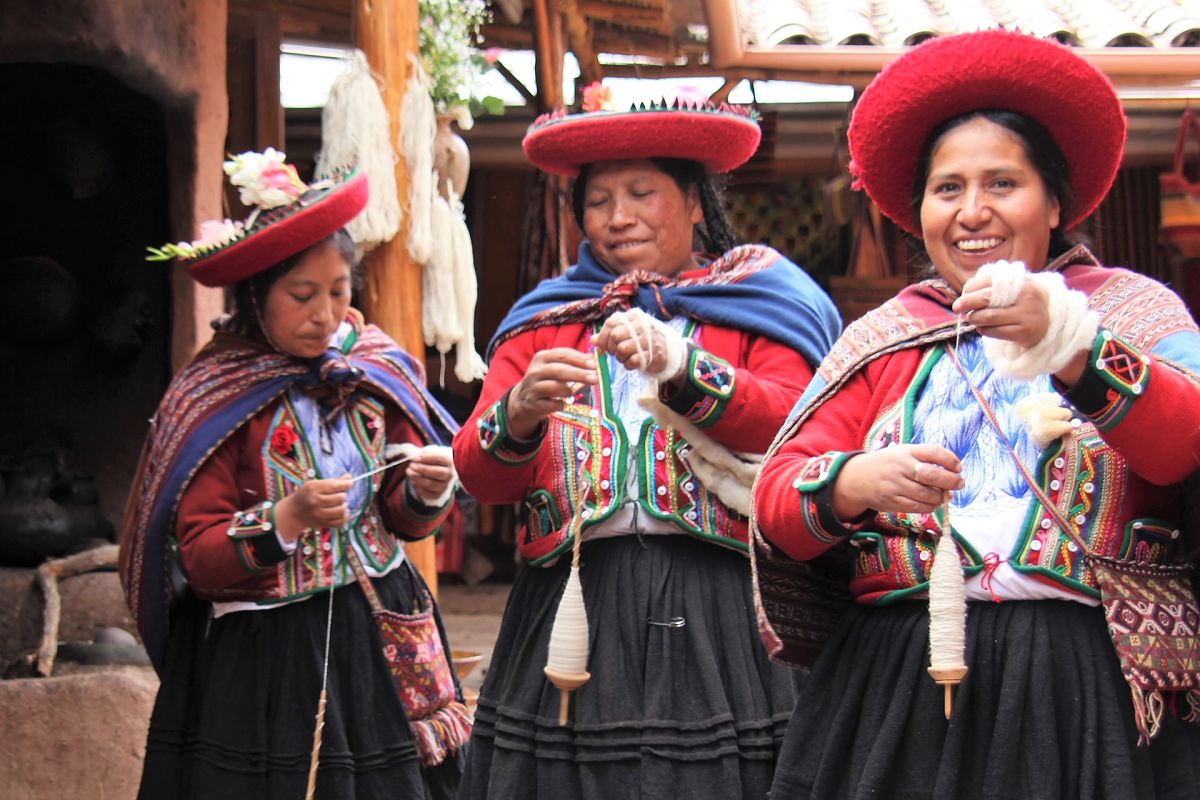 women in peruvian dresses