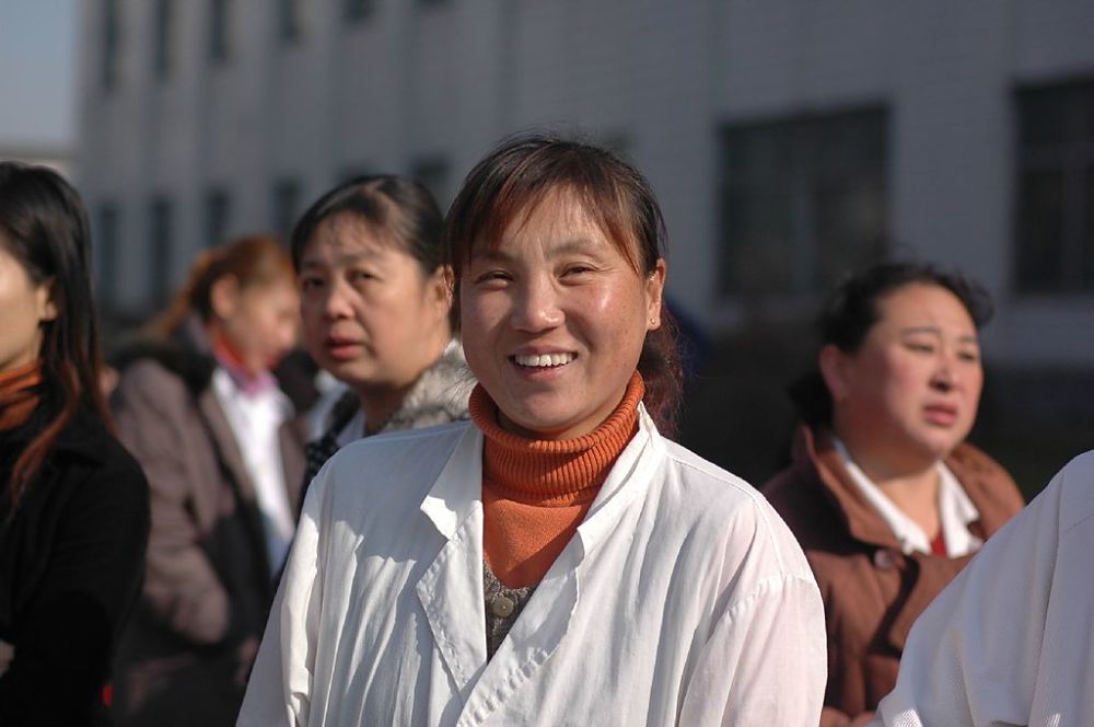 smiley chinese worker woman