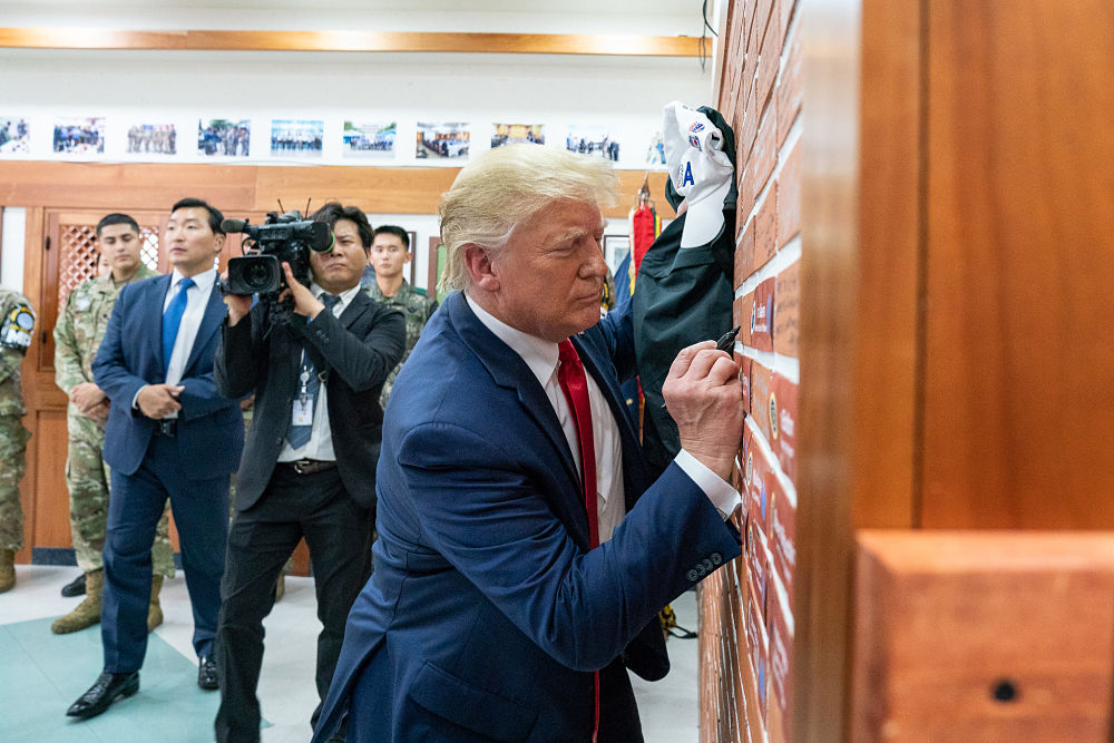 trump signs wall korea